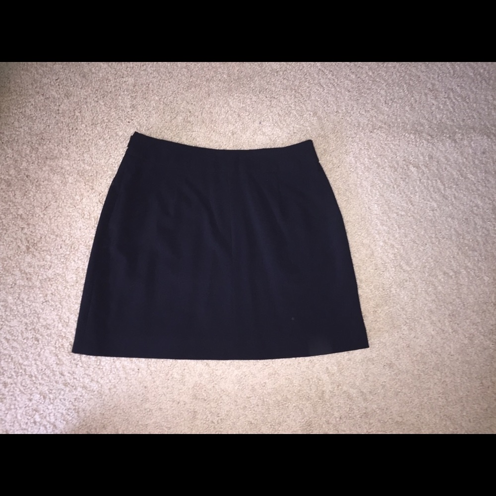 Mini skirt with leather detail buckle clos…